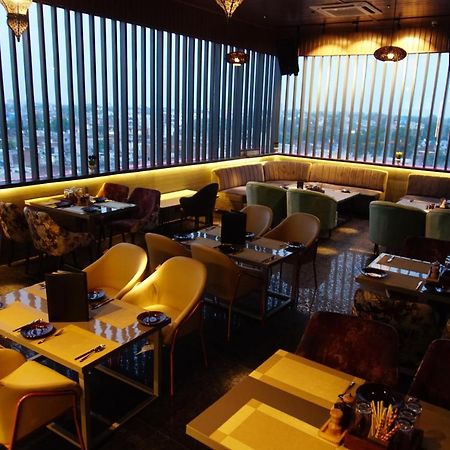 Red Orchid Hotel กานปูร์ ภายนอก รูปภาพ